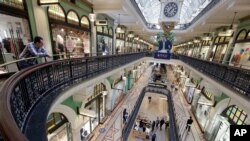 A shopping center attracts few shoppers in Sydney, Wednesday, Sept. 2, 2020. Australia's economy has suffered its sharpest quarterly drop since the Great Depression because of the pandemic.