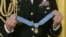 FILE - The Medal of Honor is seen before presentation in the East Room of the White House in Washington Nov. 12, 2015.