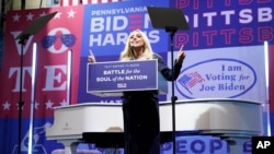 Lady Gaga speaks before performing during a drive-in rally for Democratic presidential candidate former Vice President Joe Biden at Heinz Field, Monday, Nov. 2, 2020, in Pittsburgh. (AP Photo/Andrew Harnik)