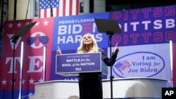 File - Lady Gaga speaks before performing during a drive-in rally for Democratic presidential candidate former Vice President Joe Biden at Heinz Field, Nov. 2, 2020, in Pittsburgh.