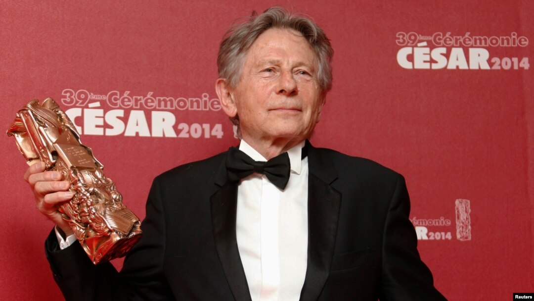 FILE - Roman Polanski poses with his Best Director award for "La Venus A La Fourrure" ("Venus in Fur") at the 39th Cesar Awards ceremony in Paris, Feb. 28, 2014.