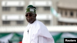 FILE - Nigeria's President Bola Tinubu looks on after his swearing-in ceremony in Abuja, Nigeria, May 29, 2023.