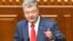 Ukrainian President Petro Poroshenko addresses lawmakers in Ukraine's Parliament in Kyiv, Ukraine, Sept. 20, 2018.