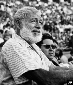 FILE - In this Nov. 1960 file photo, U.S. novelist Ernest Hemingway attends a bullfight in Madrid, Spain. (AP Photo/File)