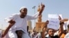 FILE - People protest Sudanese President of the Sovereignty Council Abdel Fattah Abdelrahman Burhan's decision to meet Israel's prime minister last week in a move toward normalizing relations, in Khartoum, Sudan, Feb. 7, 2020.