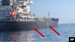 Image released by the U.S. military's Central Command, shows damage and a suspected mine on the Kokuka Courageous in the Gulf of Oman near the coast of Iran, June 13, 2019. (US Central Command)