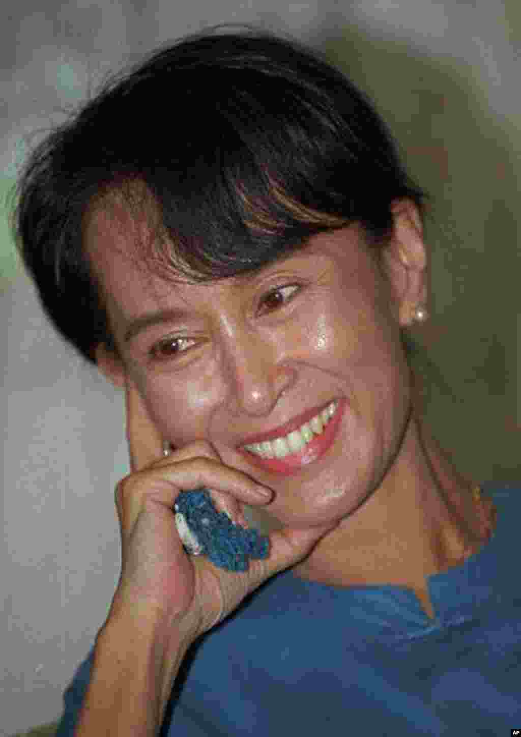 1991: Aung San Suu Kyi, Burma. She is recognized for her non-violent struggle for democracy and human rights. (AP)