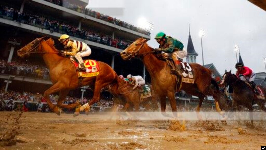 Flavien Prat rides Country House, left, to victory in the 145th running of the Kentucky Derby horse race, May 4, 2019, in Louisville, Ky. Code of Honor, right, finished second. Luis Saez on Maximum Security finished first but was disqualified.