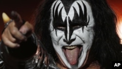 Gene Simmons of the music group Kiss performs during a concert in Mexico City, Saturday, Sept. 29, 2012. (AP Photo/Marco Ugarte)