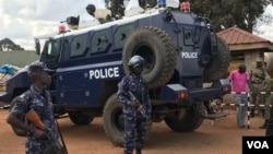 A police armored personnel carrier stands guard at the Kasangati Police station where legislator Robert Kyagulanyi (aka Bobi Wine) was said to have been held on arrival from the United States, in Kasangati, Uganda. (H. Athumani/VOA)