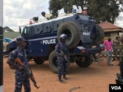 A police armored personnel carrier stands guard at the Kasangati Police station where legislator Robert Kyagulanyi (aka Bobi Wine) was said to have been held on arrival from the United States, in Kasangati, Uganda. (H. Athumani/VOA)