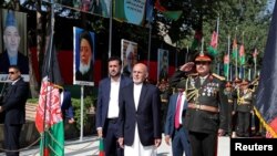  Caption Afghan President Ashraf Ghani attends Afghan Independence Day celebrations in Kabul, Aug. 19, 2019. 
