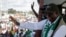 FILE — Liberia's President-Elect Joseph Boakai waves to his supporters as holds his final campaign rally for the presidential elections in Monrovia, Liberia, Oct. 7, 2023. 
