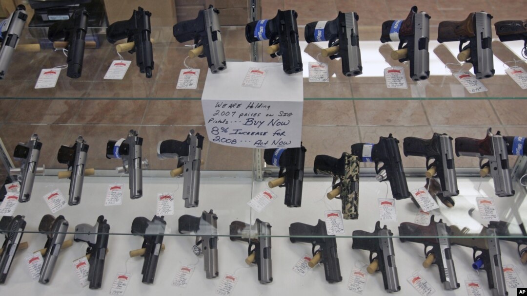 Handguns are on display at B & J Guns in Colonie, New York, June 26, 2008. The Supreme Court ruled that Americans have a constitutional right to keep guns in their homes for self-defense.