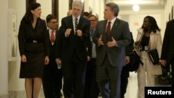 Supreme Court Nominee Judge Neil Gorsuch (C) walks with former Senator Kelly Ayotte and Senator Cory Gardner (R-CO) before a meeting on Capitol Hill in Washington, Feb. 1, 2017. 
