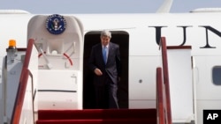 U.S. Secretary of State John Kerry arrives in Doha, Qatar, June 22, 2013.