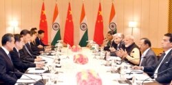 India's Prime Minister Narendra Modi (3rd R) and China's President Xi Jinping (3rd L) lead talks in Mamallapuram, on the outskirts of Chennai, India, Oct. 12, 2019.