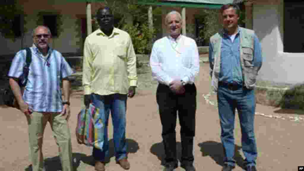 Vicenza Bishop Beniamino Pizziol, second from right, flanked by father Gianantonio Alllegri, left, and Giampaolo Marta, right, during a visit in Jericho, near Maroua, Cameroon.