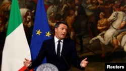 FILE - Matteo Renzi speaks during a media conference after a referendum on constitutional reform at Chigi palace in Rome, Dec. 5, 2016. 