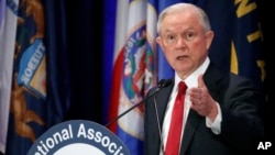 FILE - Attorney General Jeff Sessions speaks at the National Association of Attorneys General annual winter meeting, Feb. 28, 2017, in Washington. 