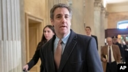 Michael Cohen, President Donald Trump's former lawyer, returns to Capitol Hill for a fourth day of testimony as Democrats pursue a flurry of investigations into Trump's White House, businesses and presidential campaign, in Washington, March 6, 2019. 