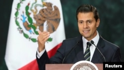 FILE - Mexico's President Enrique Pena Nieto delivers a speech in Mexico City, Mexico, Nov. 4, 2016. 