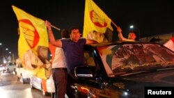 Kurdos celebran en apoyo al referéndum por la independencia en Erbil, Irak, el lunes, 25 de septiembre, de 2017.