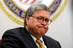 FILE - Attorney General William Barr speaks at a federal prison in Edgefield, S.C., July 8, 2019. The Justice Department says it will execute federal death row inmates for the first time since 2003. Five inmates will be executed starting in December.