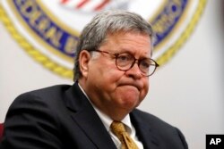 FILE - Attorney General William Barr speaks at a federal prison in Edgefield, S.C., July 8, 2019.