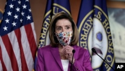 La presidente de la Cámara de Representantes de Estados Unidos, Nancy Pelosi, durante una rueda de prensa en Washingon D.C, el 7 de enero de 2021, un día después de que seguidores del presidente Donald Trump asaltaran el Capitolio.