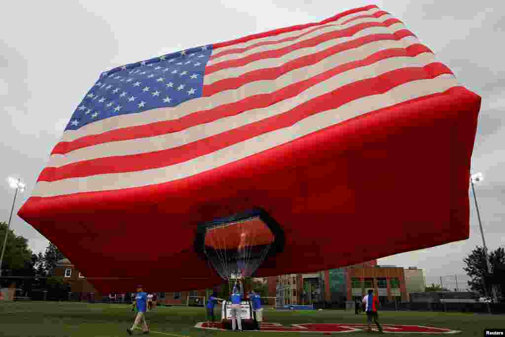The America One U.S. flag hot air balloon is raised in honor of Flag Day at Stevens Institute of Technology in Hoboken, New Jersey.