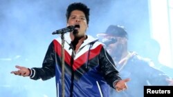 FILE - Bruno Mars performs at the 59th Annual Grammy Awards in Los Angeles, Feb. 12, 2017.