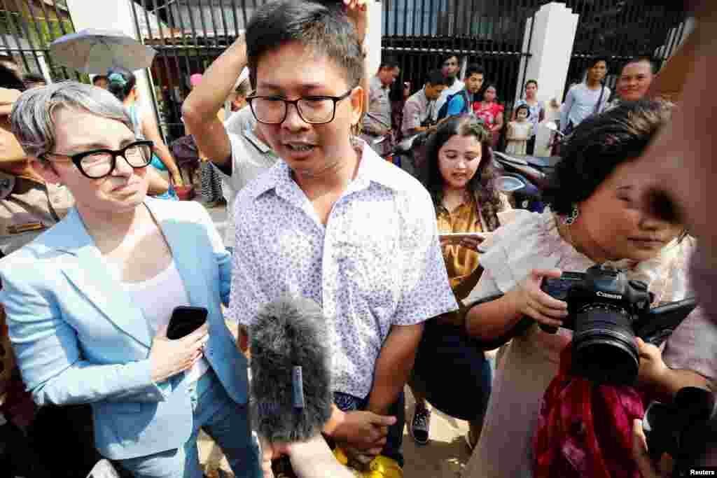 Reuters reporter Wa Lone speaks to media after he is freed from Insein prison after receiving a presidential pardon in Yangon, Myanmar, May 7, 2019.