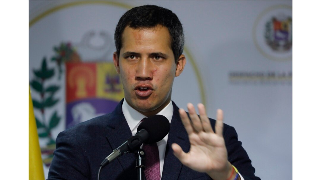 FILE - Venezuela's National Assembly President and self-proclaimed interim President Juan Guaido speaks to the press in Caracas, Venezuela, Sept. 16, 2019.