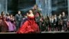 Enraged by Iago’s lies about Desdemona’s faithfulness, Otello (Aleksandrs Antonenko) loses control and insults her in front of the Venetian court. (Credit: Ken Howard/ Metropolitan Opera)