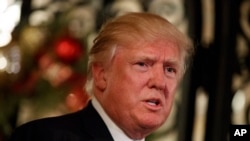 Presiden terpilih Donald Trump di Mar-a-Lago, 28 Desember 2016, Palm Beach, Florida. (AP Photo/Evan Vucci)