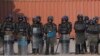 Pakistani paramilitary soldiers stand guard at a closed road leading to radical religious party's protest in Islamabad, Pakistan, Nov. 26, 2017. 