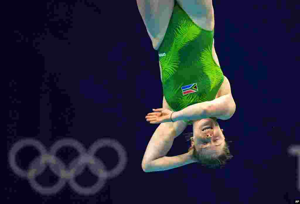 Micaela Bouter of South Africa competes in women&#39;s diving 3m springboard preliminary at the Tokyo Aquatics Centre at the 2020 Summer Olympics, Friday, July 30, 2021, in Tokyo, Japan. (AP Photo/Dmitri Lovetsky)