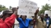 Zimbabweans rally against recent anti-immigrant violence in South Africa, outside the South African embassy in Harare, April 17, 2015.