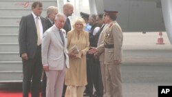 Britain's Prince Charles and his wife Camilla, Duchess of Cornwall, arrive in New Delhi, India, Wednesday, Nov. 8, 2017. The royal couple are in the country on a two-day visit.