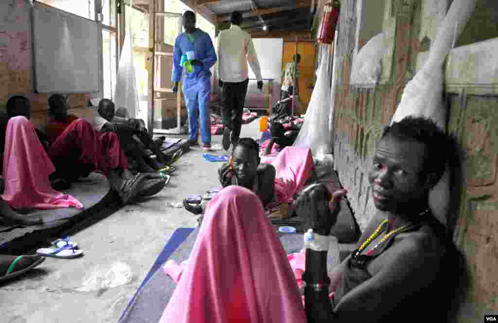 Wounded fighters from the Lou Nuer ethnic group, most of whom suffered gunshot wounds from fighting with Murle in Jonglei state, recover at a hospital in the state capital Bor.