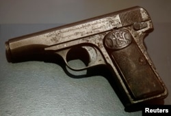 A pistol used during the assassination of Archduke Franz Ferdinand of Austria on June 28, 1914 in Sarajevo, is pictured on display at the museum of military history in Vienna on June 27, 2014.