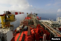 FILE - The deck of Bluewater's floating production, storage and offloading vessel Munin, which floats on the Lufeng oil field, 250 kilometers south-east of Hong Kong in the South China Sea.