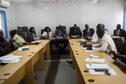 Members of the South Sudanese government's National Dialogue Committee meet to discuss how to implement peace-building policies, in Juba, South Sudan. (Chika Oduah/VOA)