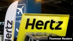 FILE - A significant chunk of Hertz's revenue comes from car rentals at airports.