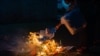 An election official burns ballots after the counting has finished at a voting station in Libreville on November 16, 2024. Gabon on Saturday held a referendum on a new constitution after a coup ended 55 years of rule by the Bongo dynasty in the oil-rich nation. 