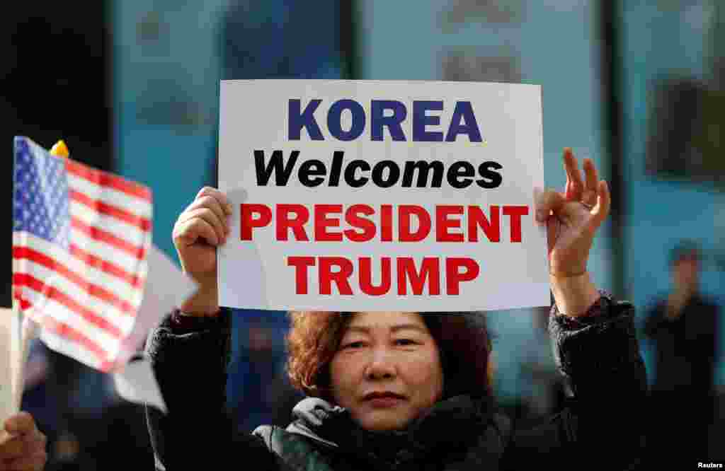 Supporters of U.S. President Donald Trump take part in a rally in central Seoul, South Korea, Nov. 7, 2017.