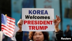 Південні корейці вітають президента Дональда Трампа