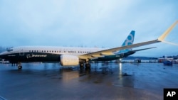 FILE - A Boeing 737 MAX airplane is shown parked before an employee-only rollout event in Renton, Washington, Dec. 8, 2015. India's low-cost airline SpiceJet plans to buy up to 205 next-generation Boeing planes worth $22 billion in a major deal to expand 