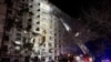 Rescuers work at the site where an apartment building was hit by a Russian air strike, amid Russia's attack on Ukraine, in Kharkiv, Ukraine October 30, 2024.